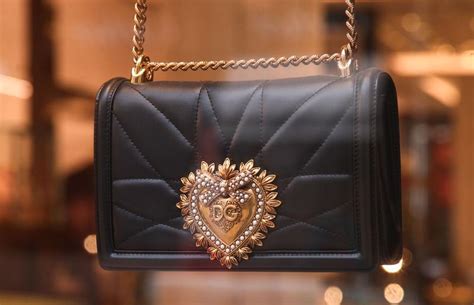 dolce and gabbana purse magnetic snaps fake|is a dolce and gabbana purse real.